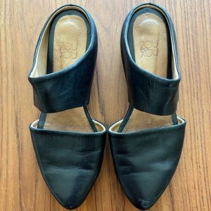 ZOU XOU Mules Marked size 7, best fits 6.5